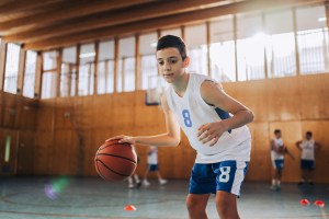 Youth basketball player working on their ball handling.
